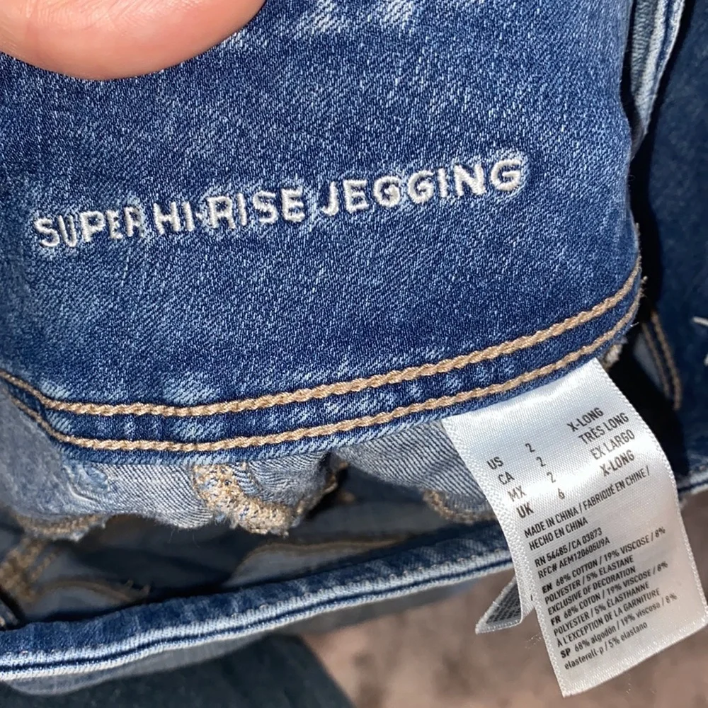 American Eagle super hi rise distressed skinny jeans